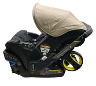 Shop Doona Infant Car Seat & Stroller Combo, 2024, Warm Stone at GoodBuy Gear