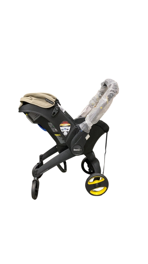 Shop Doona Infant Car Seat & Stroller Combo, 2023, Limited Edition Beige/Warm Stone at GoodBuy Gear