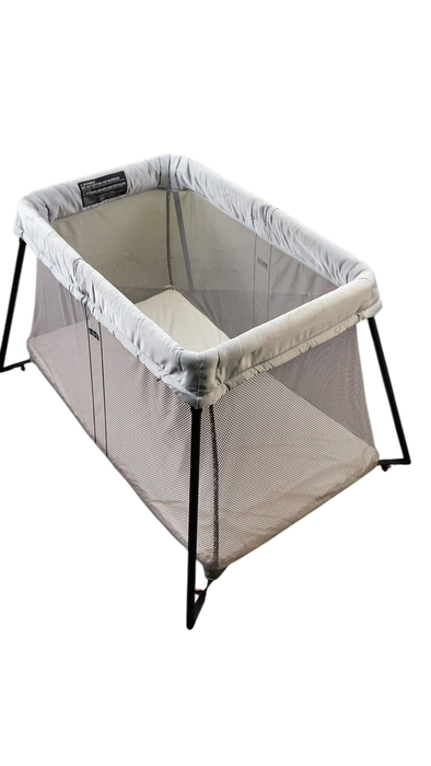 Shop BabyBjorn Travel Crib Light Bundle with Fitted Sheet, Silver at GoodBuy Gear