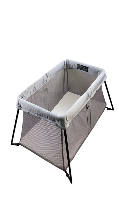 Shop BabyBjorn Travel Crib Light Bundle with Fitted Sheet, Silver at GoodBuy Gear
