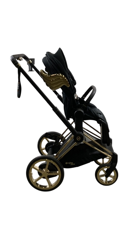 Shop Cybex E-PRIAM Electric Stroller, 2022, Gold With Black Details, Wings By Jeremy Scott, with Battery at GoodBuy Gear