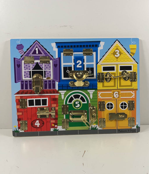 used Melissa & Doug Latches Board