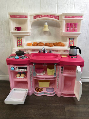 The Play Kitchen + Complete Chef Set at Lalo