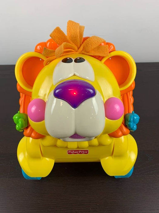 secondhand Fisher Price Stride-to-Ride Lion