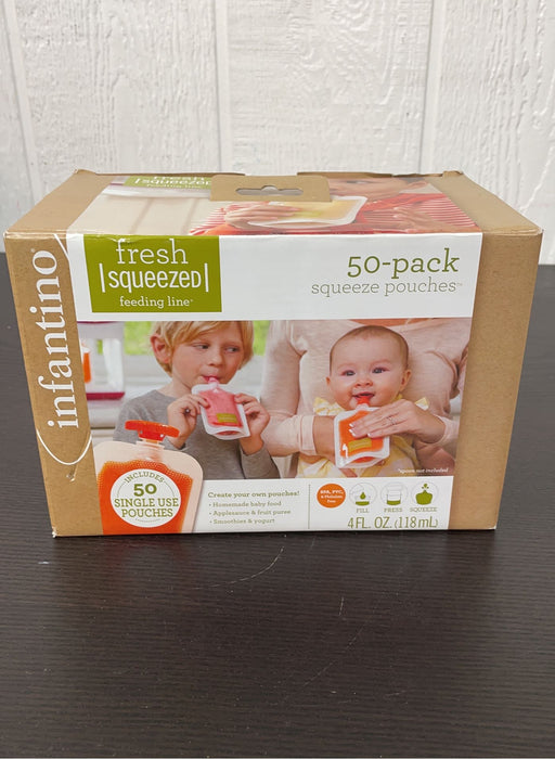 secondhand Infantino Squeeze Pouches, 4 fl oz., 50 count, with “couple of spoons”