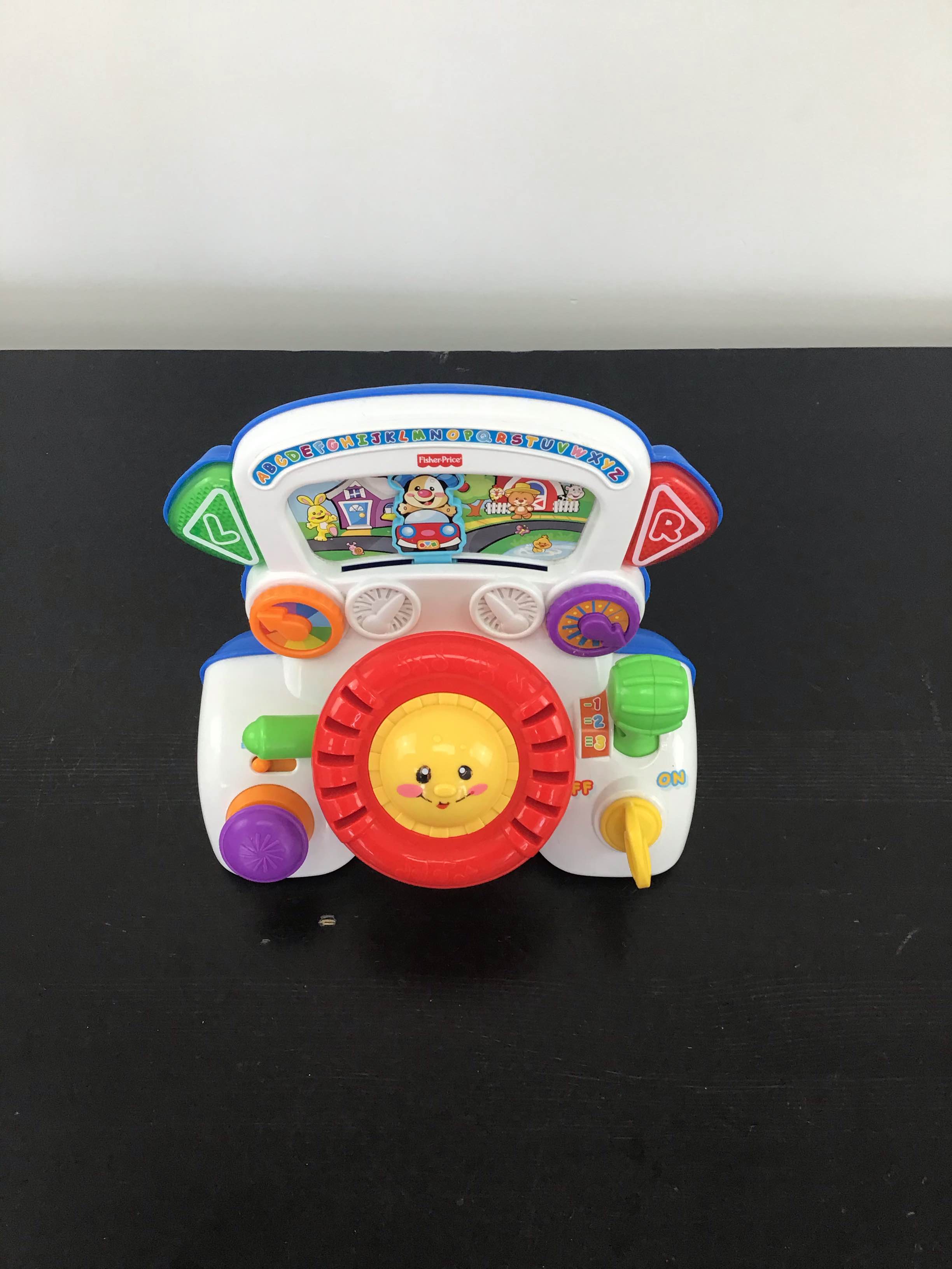 Fisher price rumble and store learn driver