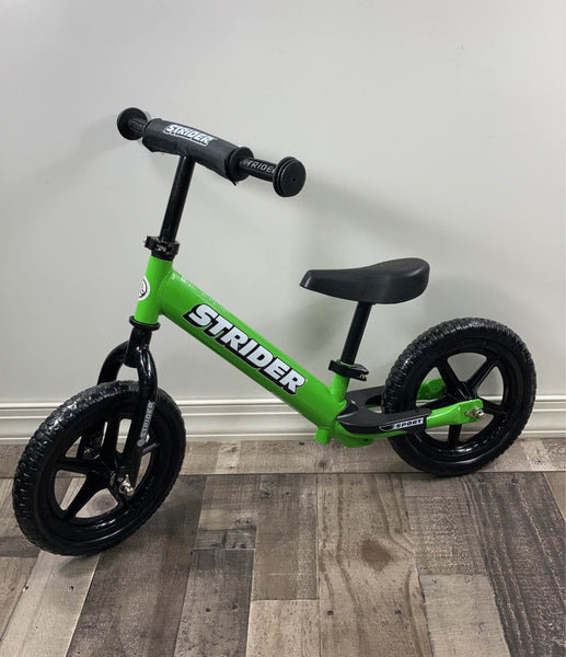 Strider green on sale balance bike