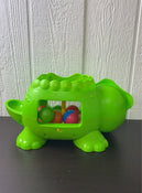 secondhand Fisher Price Ball Pop Dinosaur
