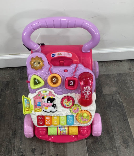 used VTech Sit-To-Stand Learning Walker, - pink & purple