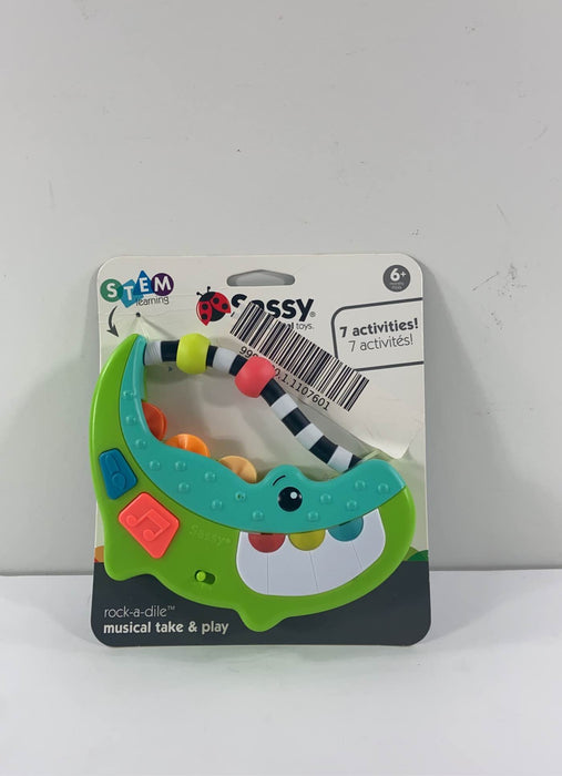 used Sassy Rock-A-Dile Musical Toy