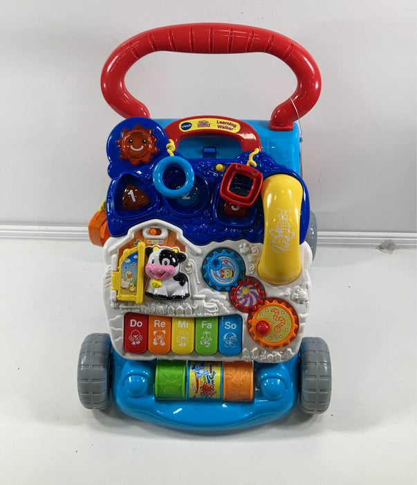 used VTech Sit-To-Stand Learning Walker, Blue/Red