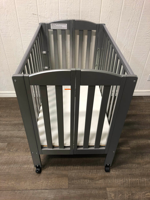 secondhand Dream On Me 2 In 1 Portable Folding Stationary Crib, Silver