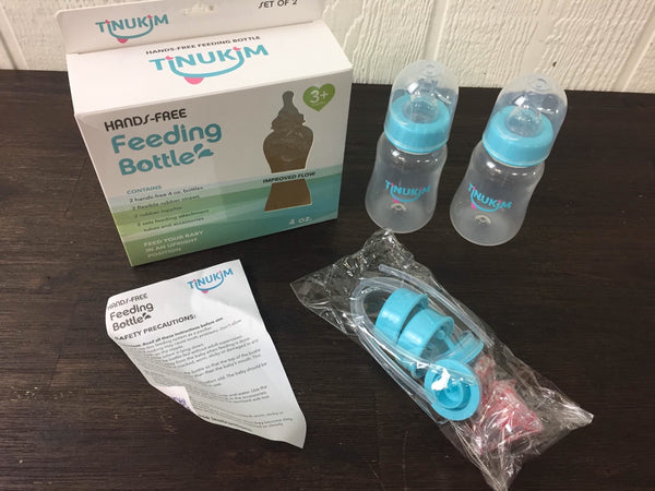 Hands free feeding bottle clearance tinukim