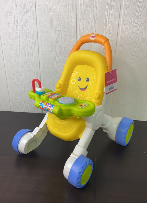 used Fisher Price Stroll N Learn Walker