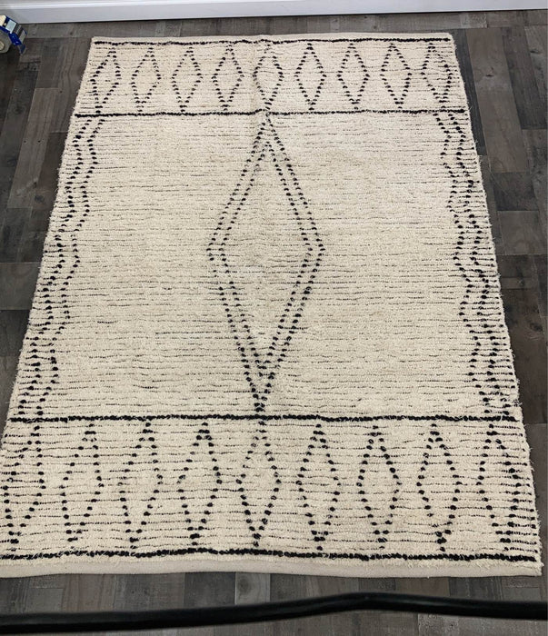 used Rug, 84” x 60”