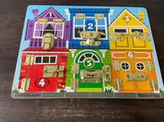used Melissa & Doug Latches Board