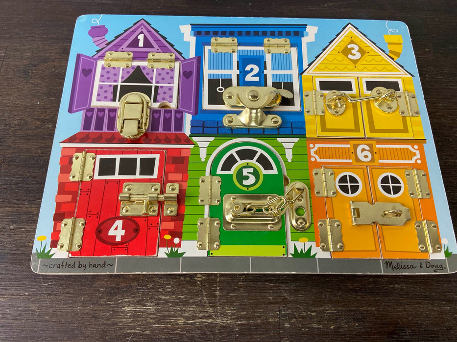 used Melissa & Doug Latches Board