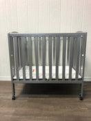 used Dream On Me 2 In 1 Portable Folding Stationary Crib, Silver