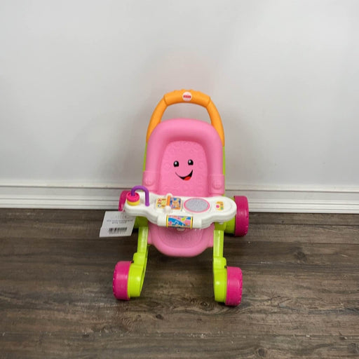 used Fisher Price Stroll N Learn Walker