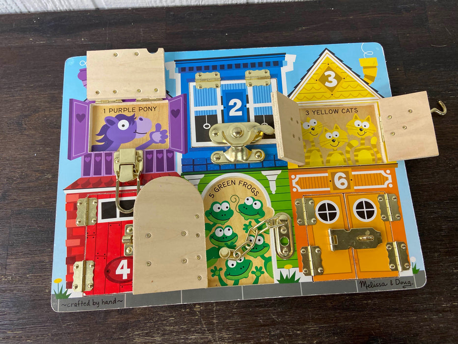 secondhand Melissa & Doug Latches Board