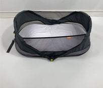 used Munchkin Brica Fold ‘n Go Travel Bassinet