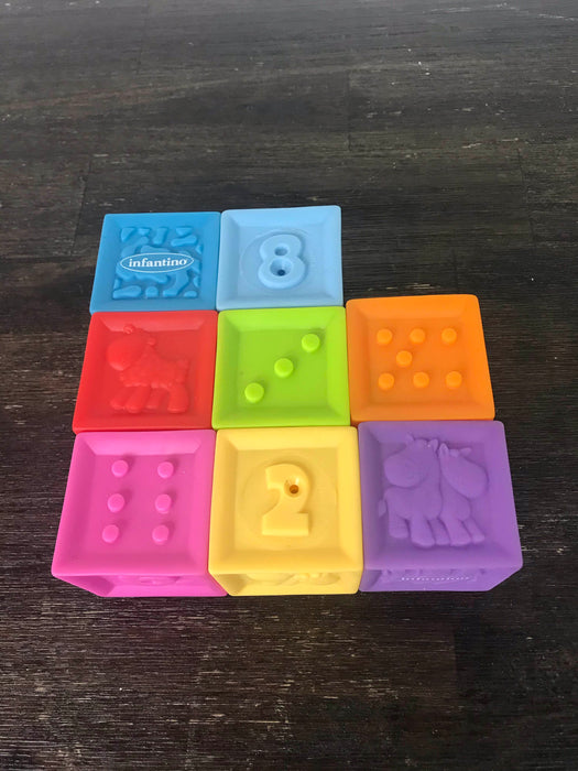 secondhand Infantino Squeeze & Stack Block Set