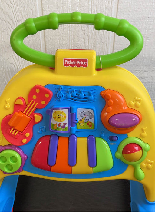 secondhand Fisher Price Brilliant Basics Musical Activity Walker