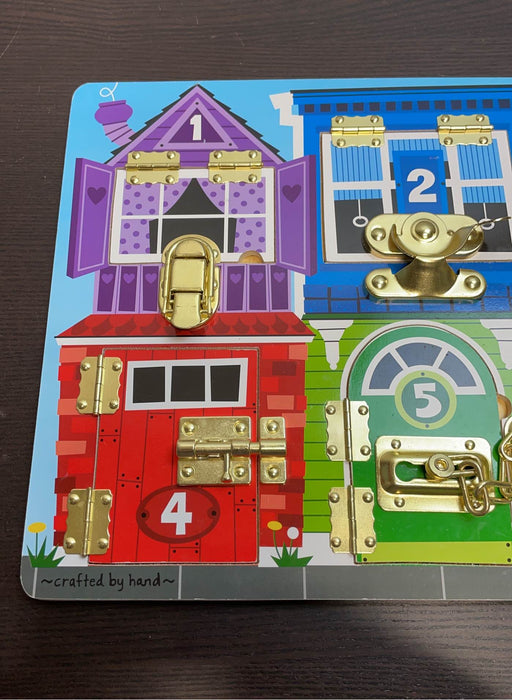 secondhand Melissa & Doug Latches Board