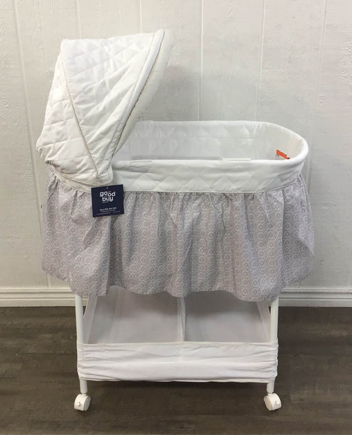 used Delta Children Deluxe Gliding Bassinet