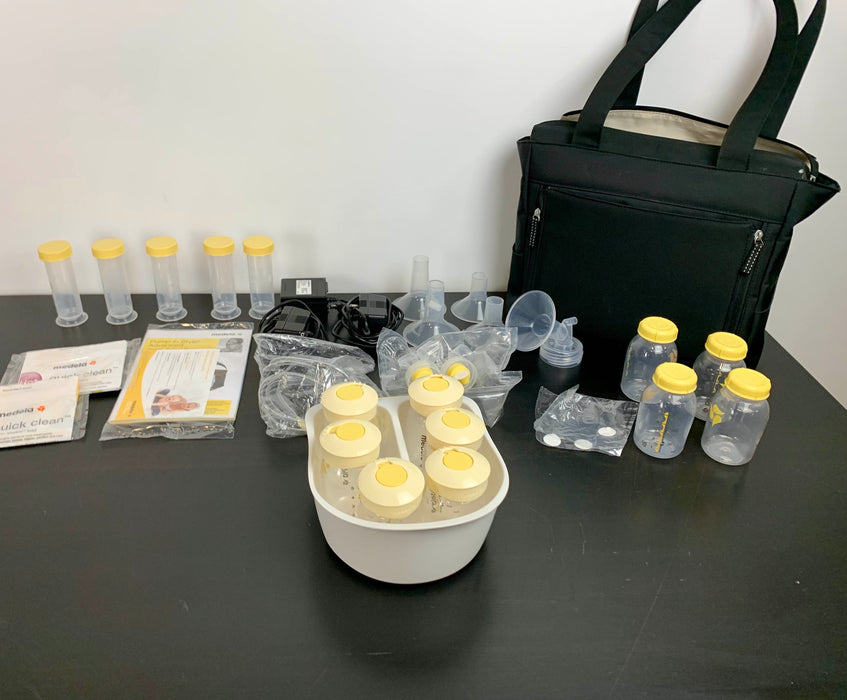 used Medela Breast Pump & Bottles