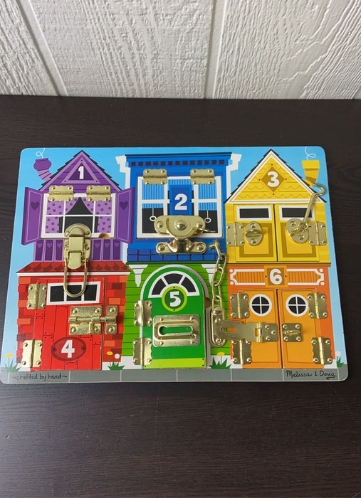 used Melissa & Doug Latches Board