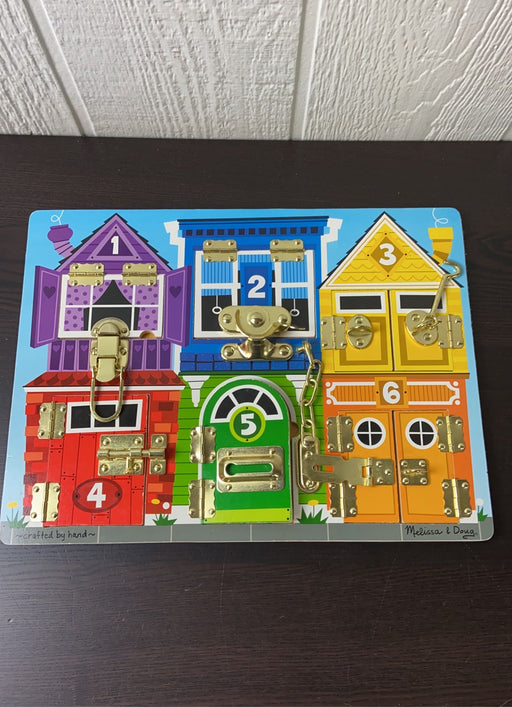 used Melissa & Doug Latches Board
