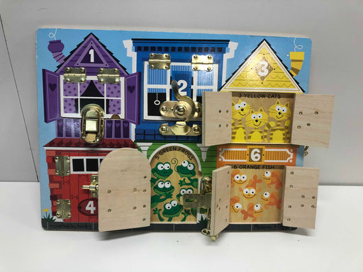 secondhand Melissa & Doug Latches Board