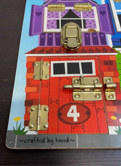 secondhand Melissa & Doug Latches Board