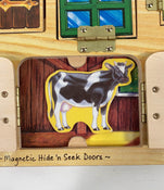 used Melissa & Doug Hide And Seek Activity Board