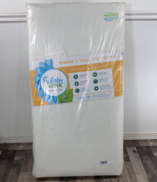 used Lullaby Earth Healthy Support 2-Stage Crib Mattress