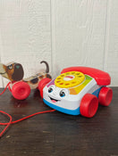 used Fisher Price Chatter Telephone, And Dog Pull toy 