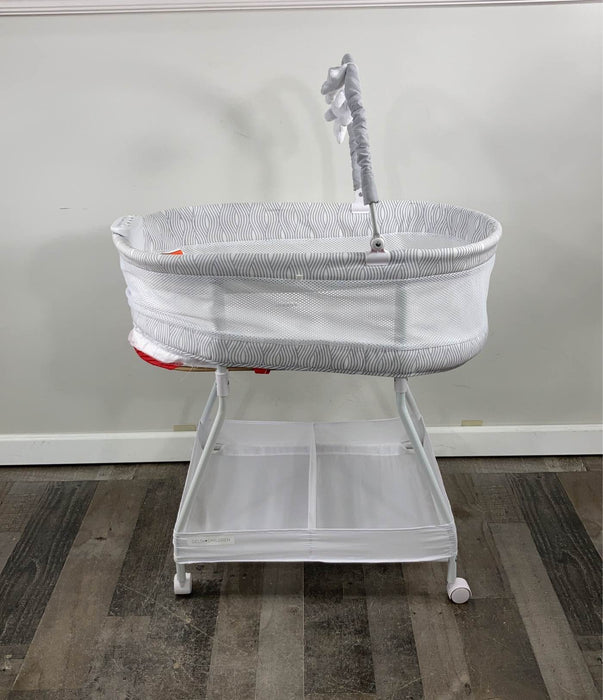 used Delta Children Wave Vibrating Bassinet With Toy Bar