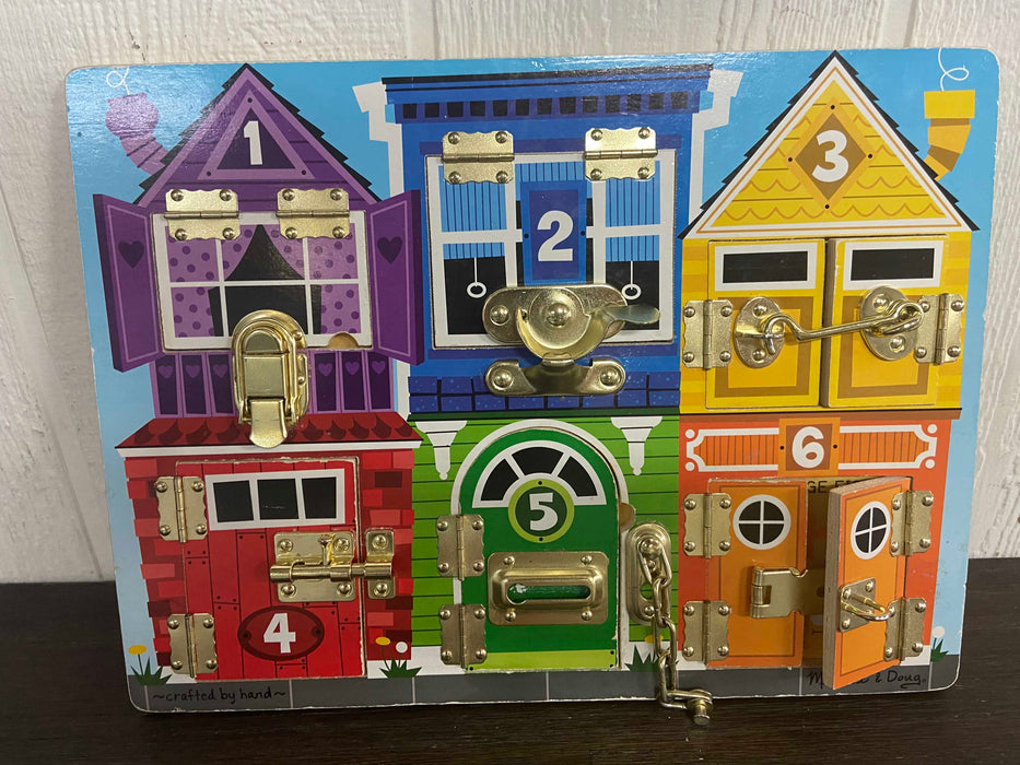 used Melissa & Doug Latches Board