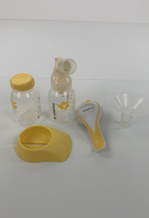 Shop Medela Harmony Manual Breast Pump w/ 2 Micro Steam Bags at GoodBuy Gear