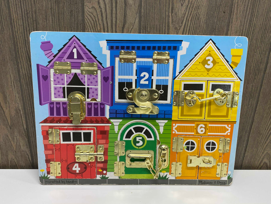 used Melissa & Doug Latches Board