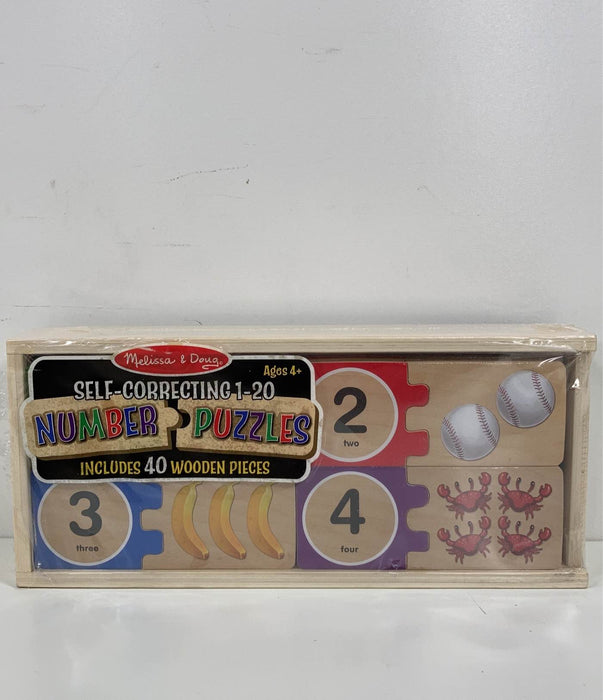 used Melissa & Doug Self-Correcting Wooden Number Puzzles