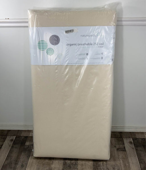 used Naturepedic Organic Breathable 252 Coil Baby & Toddler 2 Stage Mattress