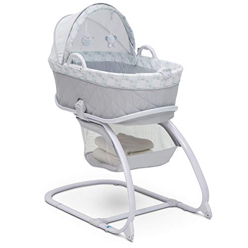 used Delta Children Deluxe Moses Bassinet