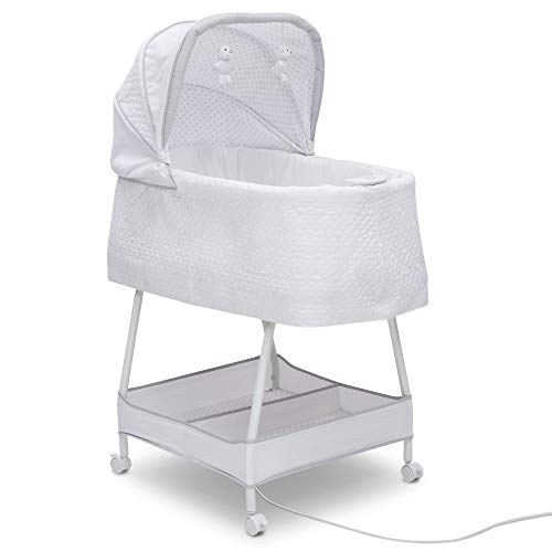 secondhand Delta Children Silent Auto Gliding Elite Bassinet