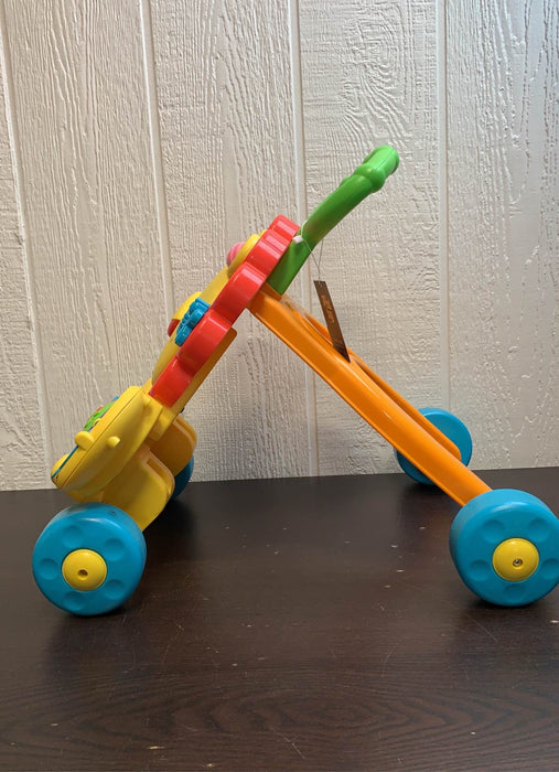secondhand Fisher Price Musical Lion Walker