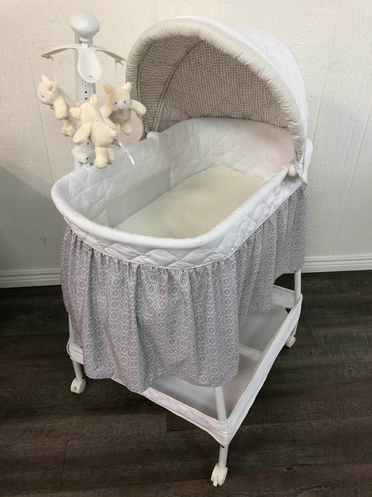 used Delta Children Deluxe Gliding Bassinet