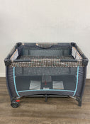 used Toys R Us 2-in-1 Bassinet & Playard