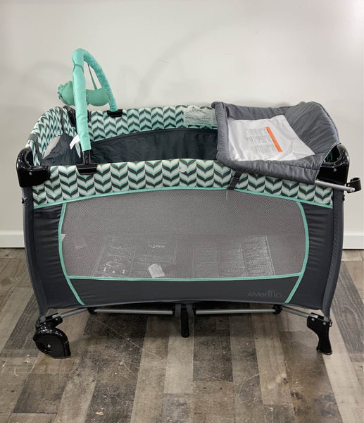 evenflo pack n play with bassinet Evenflo Portable BabySuite Deluxe Playard