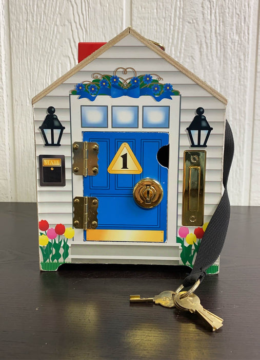 used Melissa & Doug Take-Along Wooden Doorbell Dollhouse